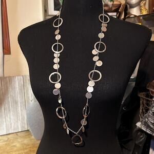 Long Silver Tone Necklace with Circular and Disc Accents